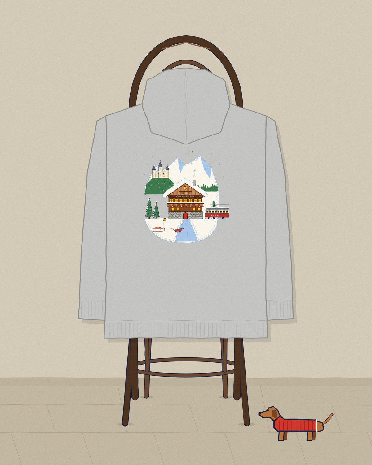 The heather grey Gstaad hoodie over a café chair.